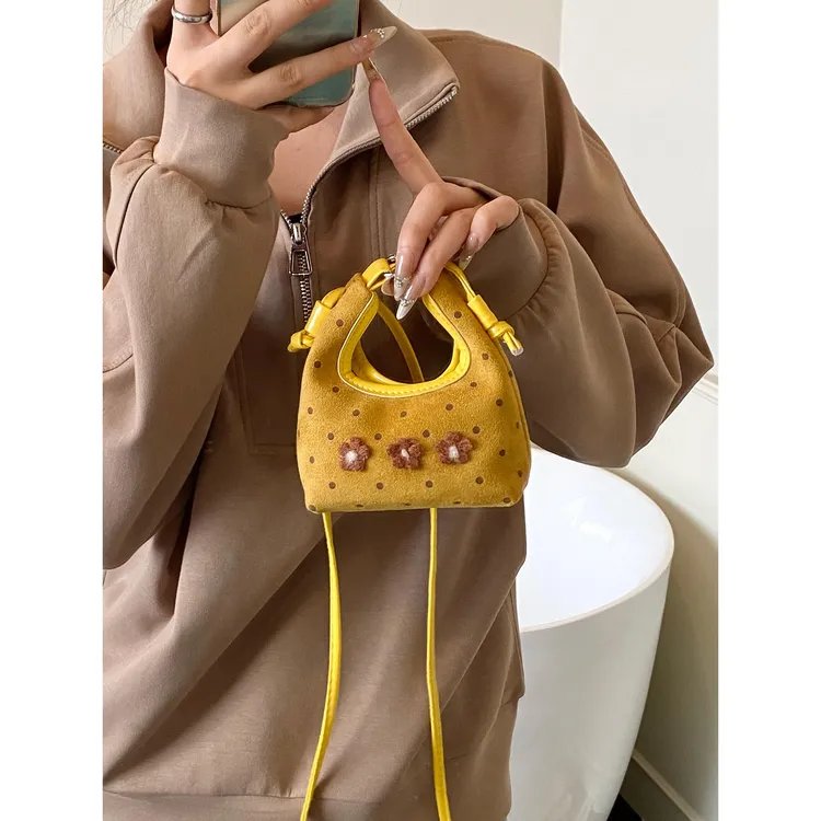 高级感小众迷你包包女夏天2025新款时尚磨砂覆古斜挎包手提饺子包