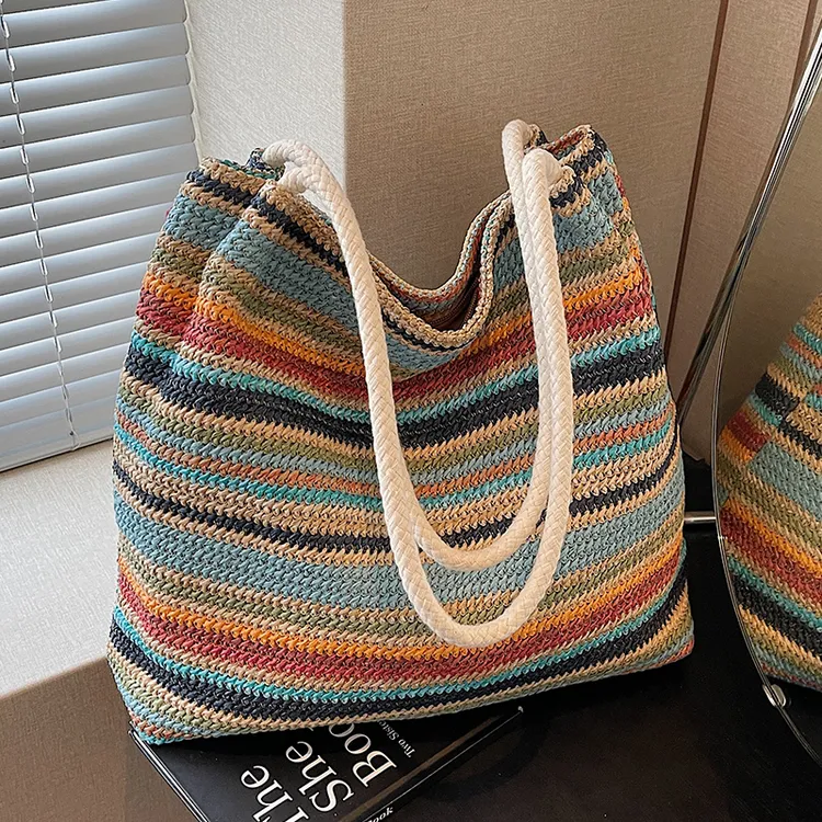 时尚百搭通勤大容量包包女式2025新款单肩包超火编织托特包草编包