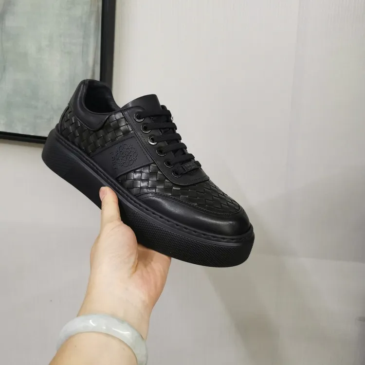 003头层牛皮休闲男鞋编织款品牌撤柜