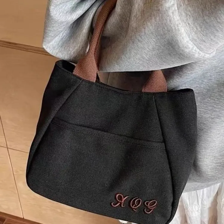 小众帆布包女出门上班小拎包通勤托特包2025新款百搭饭盒手提包