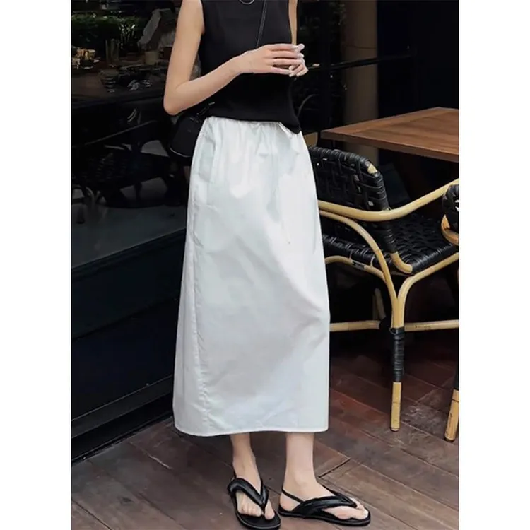 白色气质花苞半身裙女夏季高腰抽绳宽松高级感开叉时尚灯笼中长裙