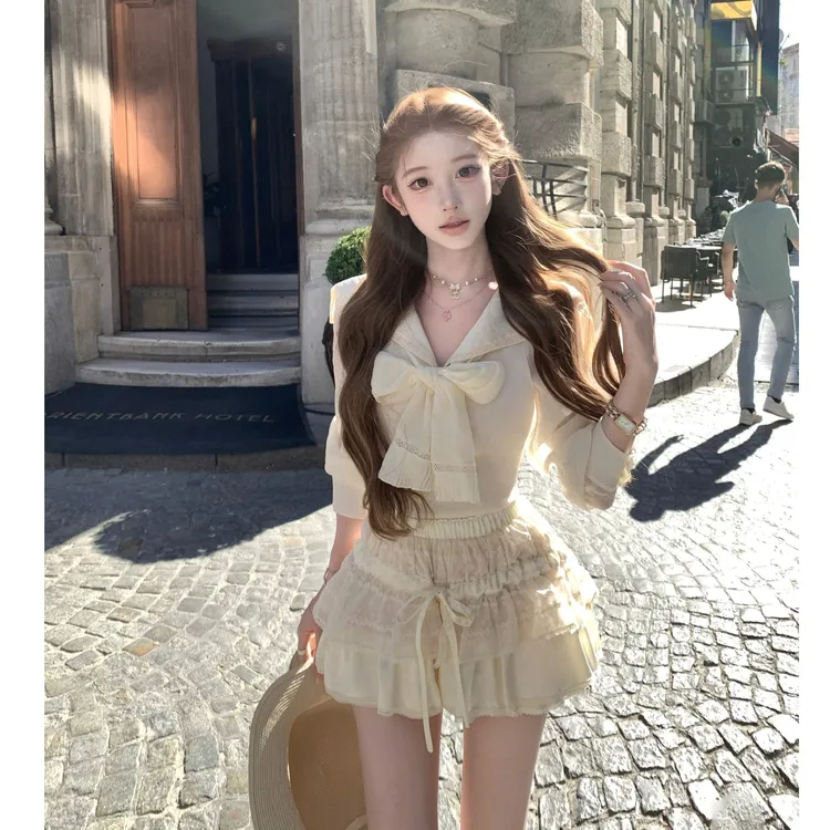  即兴圆舞曲 秋季新款手打百褶蝴蝶结衬衫上衣蛋糕裙裤套装女
