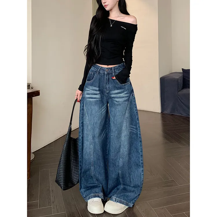 深蓝色弯刀阔腿牛仔裤女2025早秋新款美式高腰宽松设计感拖地长裤