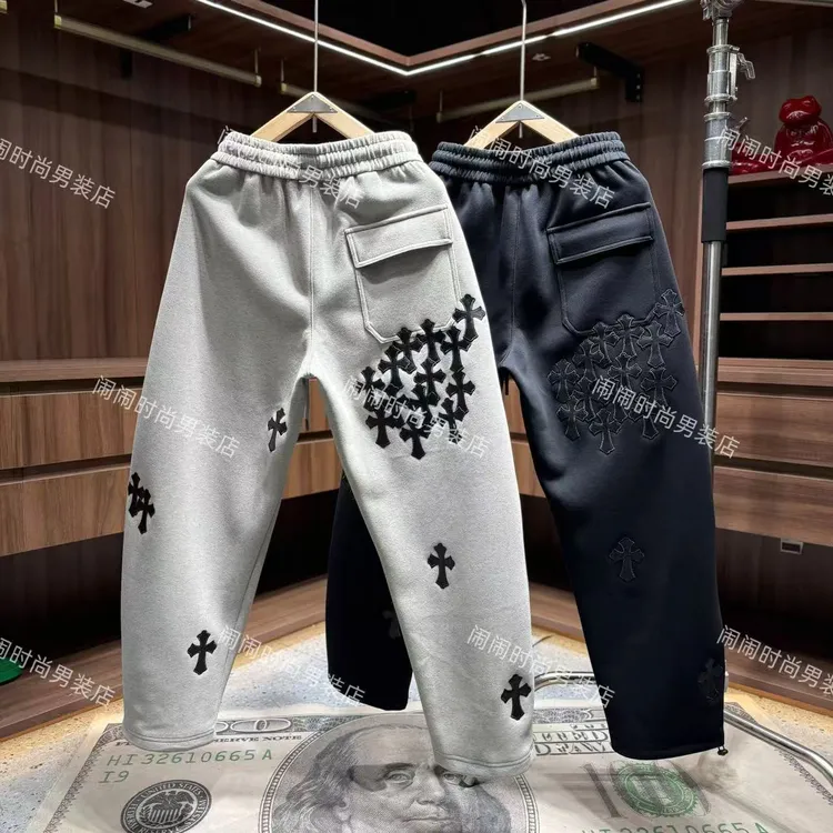 2551秋冬新款加厚高街潮流设计师贴皮十字花设计弯刀休闲裤