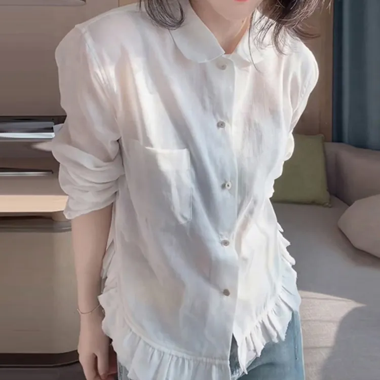 早秋新款时尚法式白色不规则荷叶边衬衫女设计感漂亮纯色淑女上衣