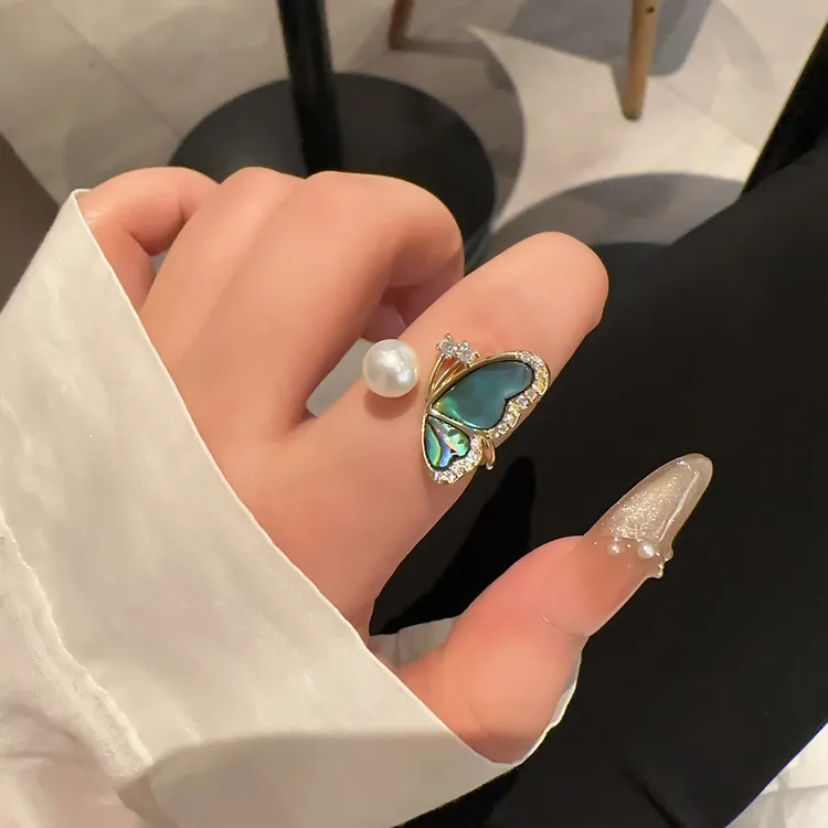 oushipei/欧诗佩 铜合金仿珍珠戒指 不对称幻彩鲍鱼贝珍珠戒指女