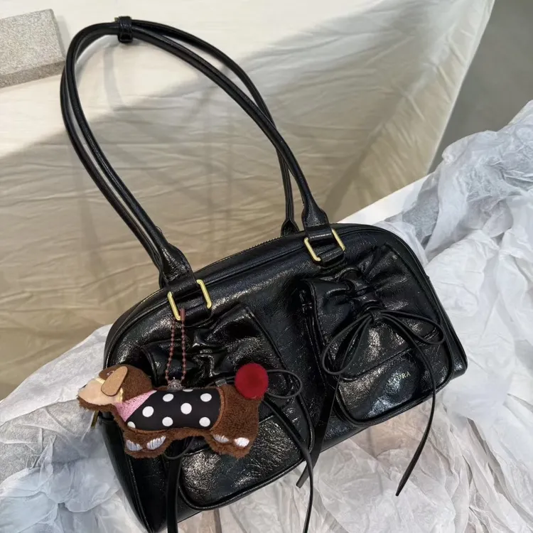 【叛逆少女】劳拉新款蝴蝶结保龄球腋下女包小众复古高级大容量女包