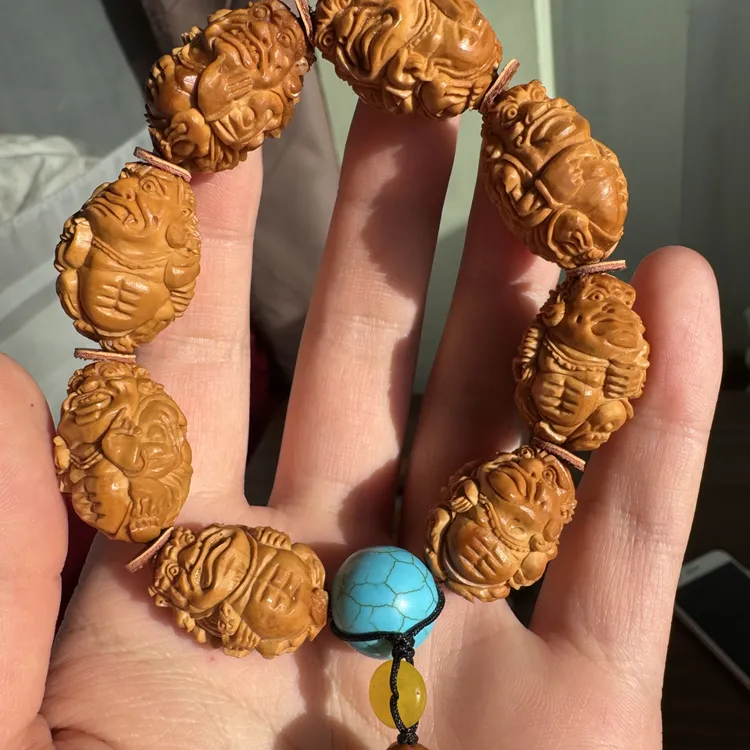 橄榄核核雕尺寸19八大金刚手工文玩手串手持挂件精品核雕核质红润