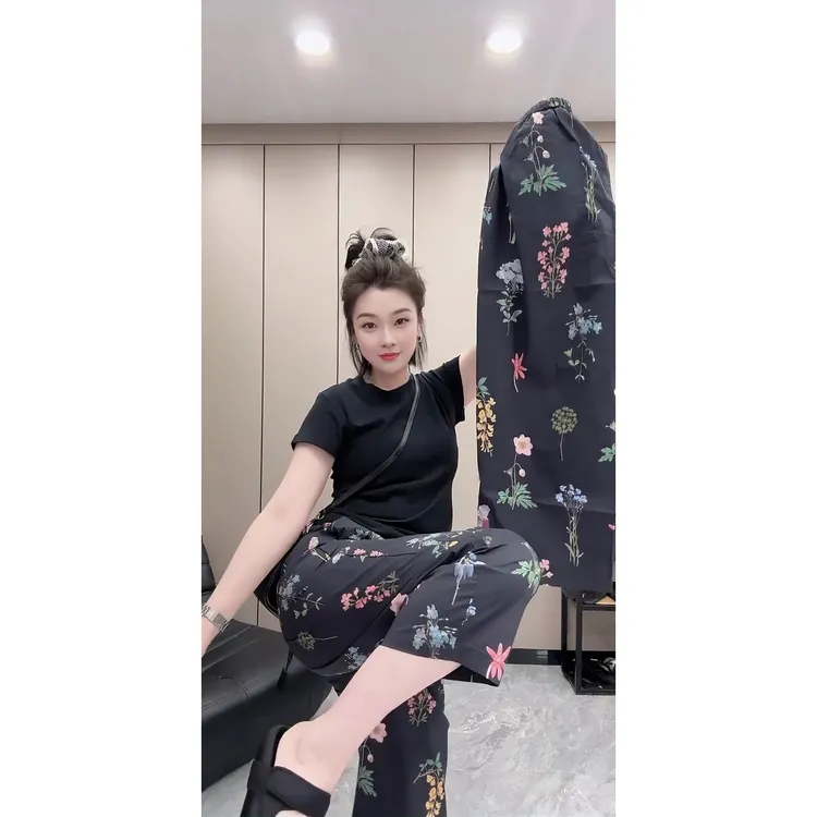 欧货2025夏季洋气花朵棉麻九分裤哈伦裤女百搭松紧高腰阔长裤休闲