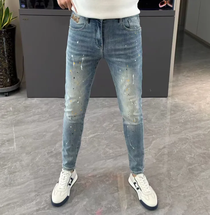 裤子男夏季新款牛仔裤男时尚泼墨印花小脚裤个性刺绣长裤修身显瘦