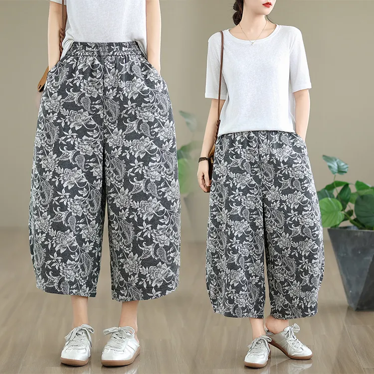 夏季新款时尚休闲复古提花九分牛仔裤女松紧腰大码宽松显瘦哈伦裤