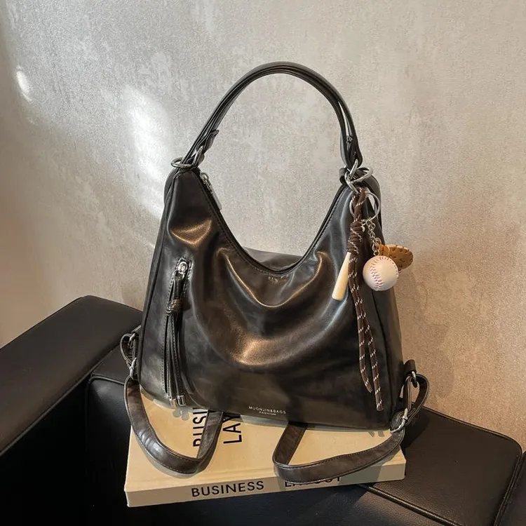 大容量双肩包包女式2025新款单肩斜挎包轻奢小众高级感三用托特包