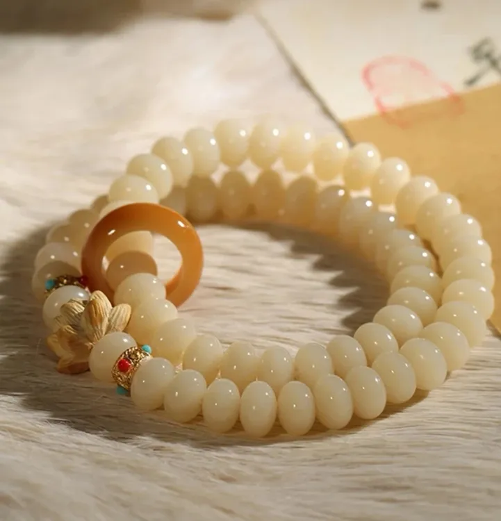 （好运连连）奶黄双圈菩提根跑环莲花款手串手持（盘玩袋）