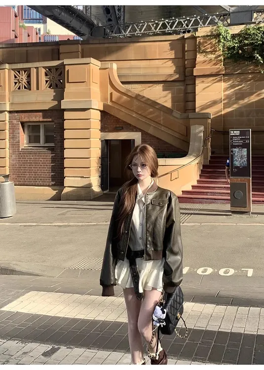 2025年早秋季新款气质收腰大裙摆长袖衬衫不规则收腰百褶短裙套装