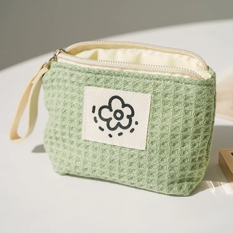 花朵华夫格化妆包可爱简约拉链零钱包便携口女小巧手腕包