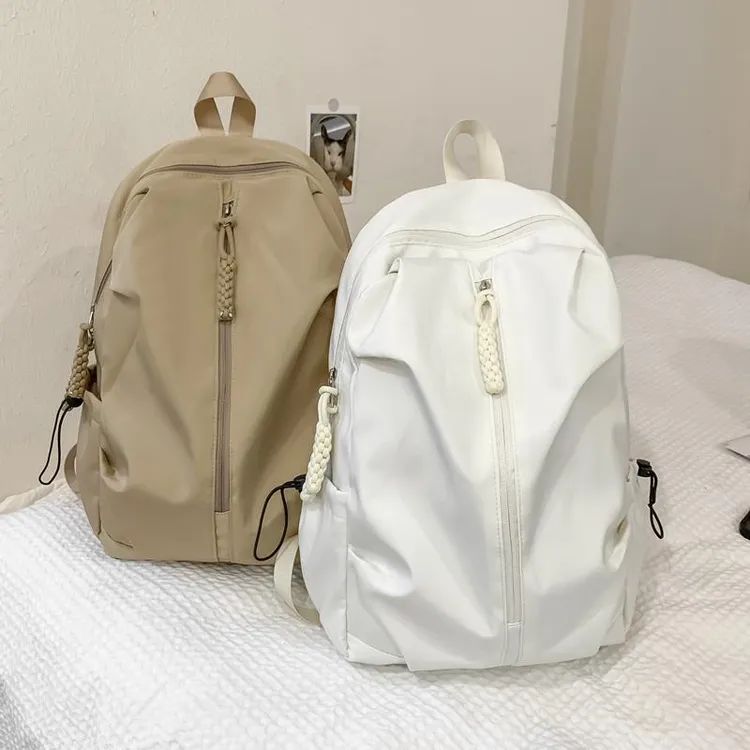 旅行书包ins大学生简约双肩包韩版百搭大容量初中休闲背包尼龙