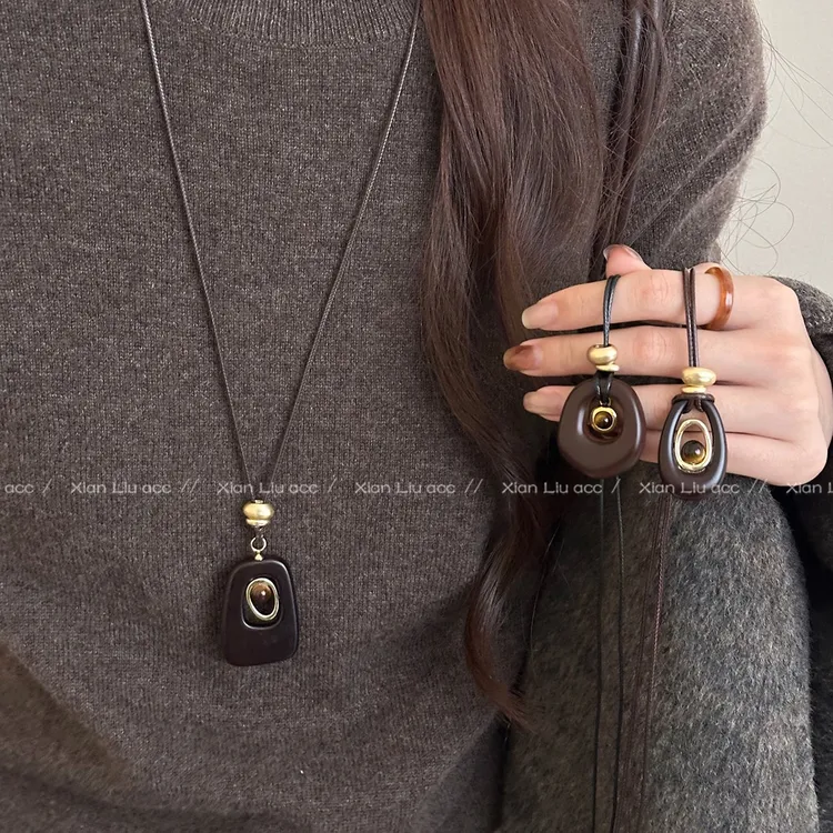 铜合金项链  不规则镂空虎眼石吊坠项链女秋冬长款毛衣链复古配饰