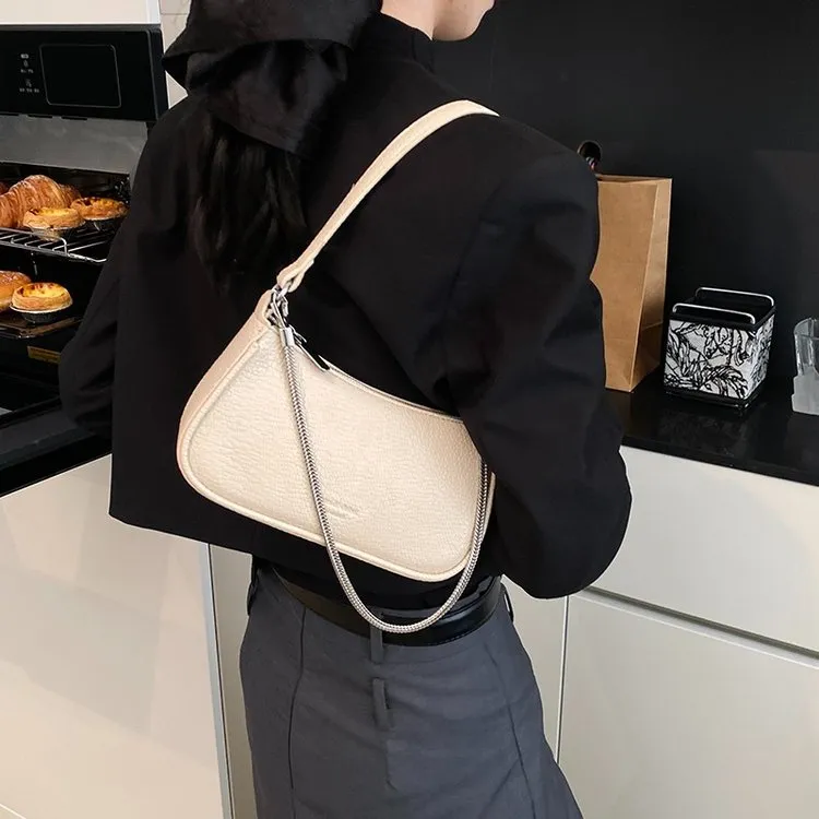 潮流百搭手拎包2025春季新款时尚简约饺子包高级感小众设计单肩包