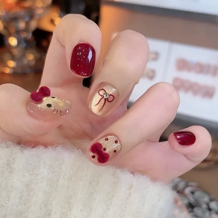 2024新款圣诞节丝绒蝴蝶结波点猫眼手工穿戴甲贴片显白短款美甲