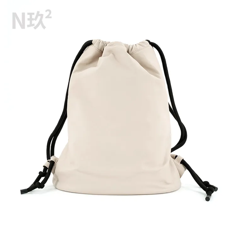山羊皮双肩抽绳背包四季通用简约风系带双肩束口时尚大容量包 