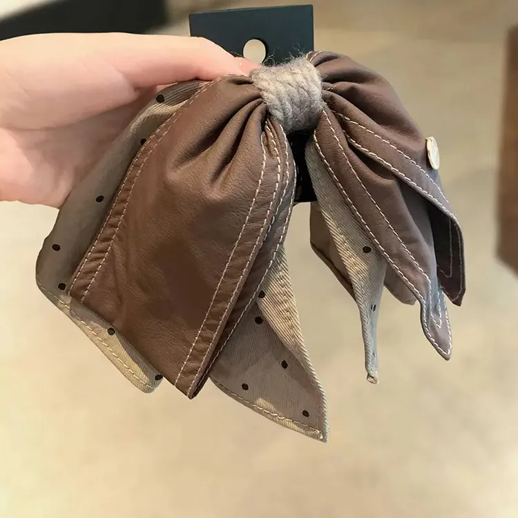 韩国新款高端气质皮质咖色波点布艺蝴蝶结抓夹马尾夹后脑勺鲨鱼夹