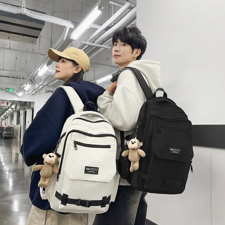 2025新款小学生初中生书包男女生高中大容量超轻减负护脊双肩背包