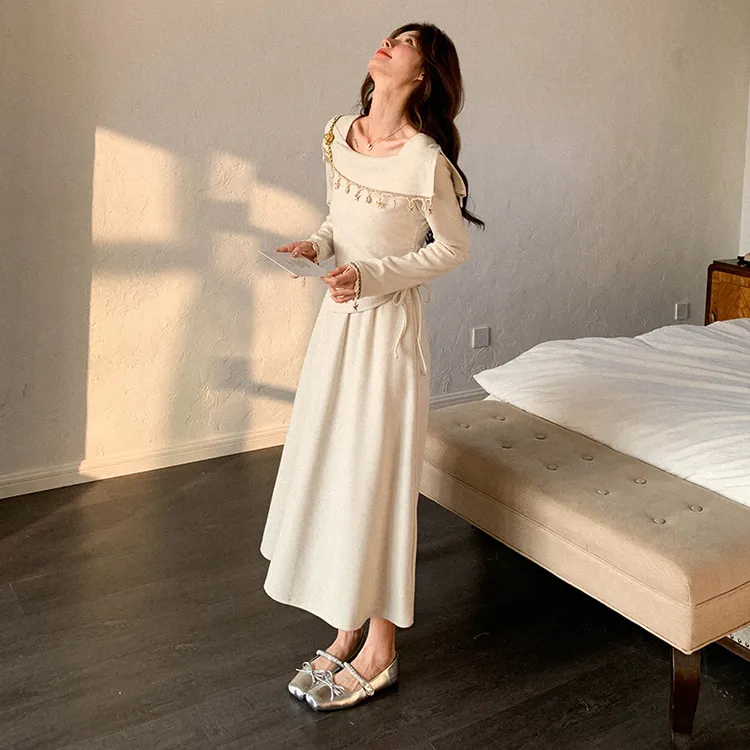 浅米色温柔气质千金风假两件连衣裙女2025春新款拼接流苏方领时尚