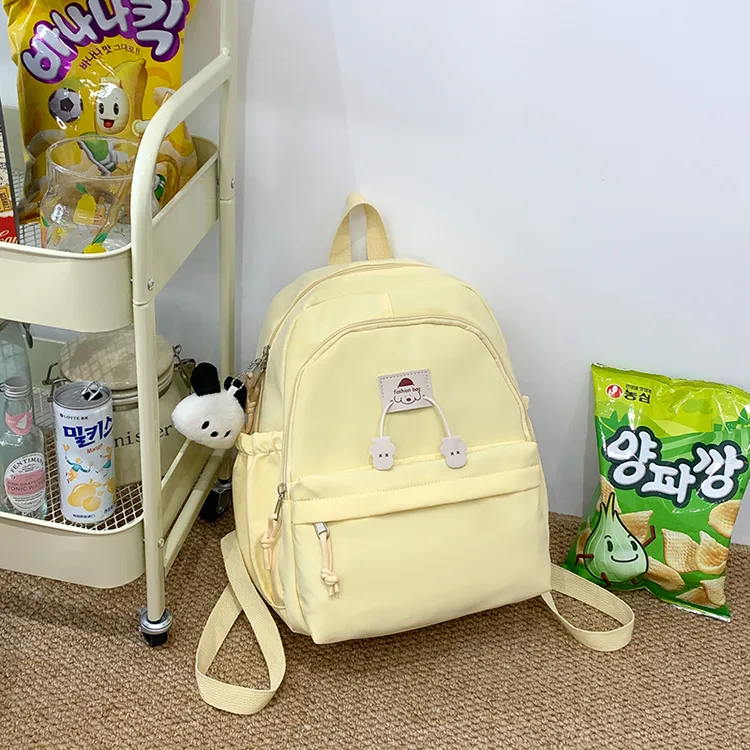 梓文书包女生小学生2025新款研学包男女童减负护脊背包儿童双肩包