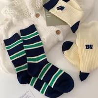 111袜子女秋冬中筒袜字母百搭咖色潮流中筒