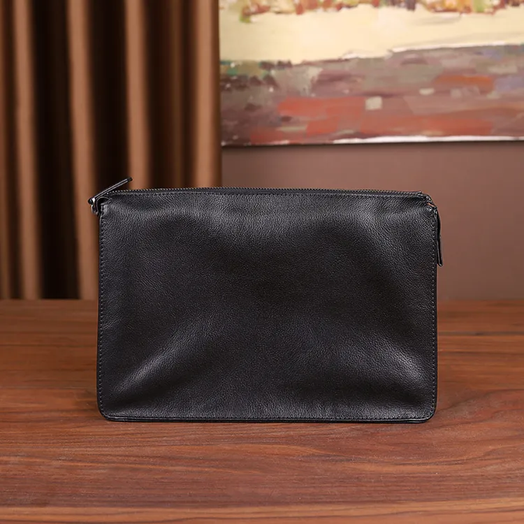 男士牛皮黑色百搭大容量手包真皮男包通勤商务休闲男士多功能包包