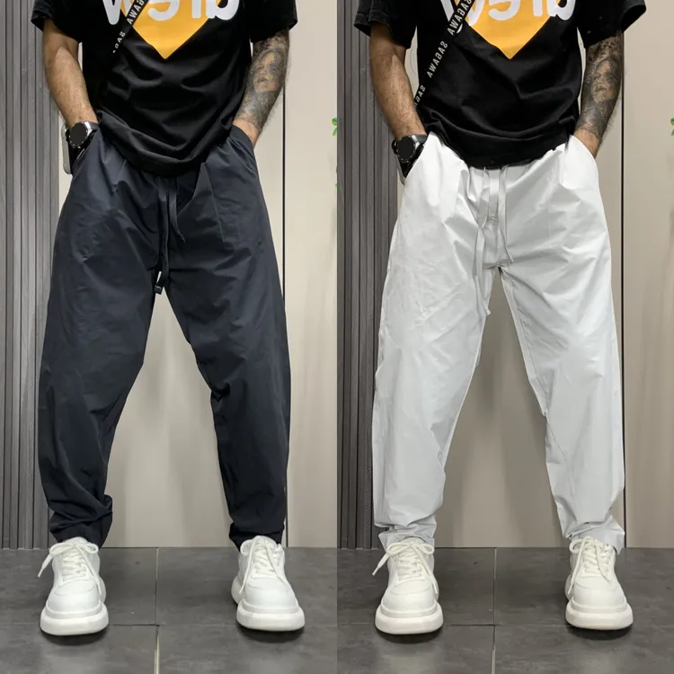 夏季薄款纯色潮简约休闲裤设计师男裤弹力哈伦宽松速干百搭休闲裤