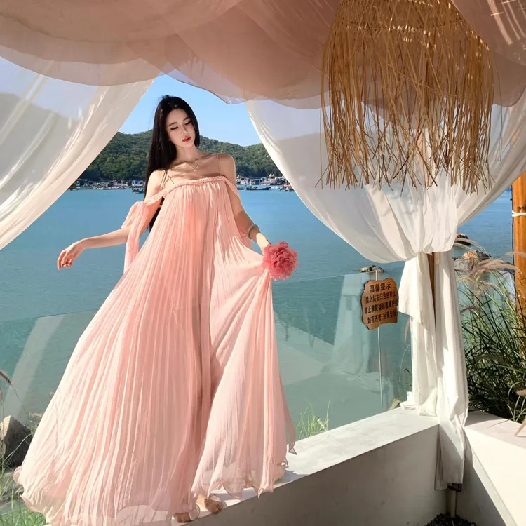 实拍粉樱飞舞夏日绝美海边度假轻熟小众不撞款粉色长款吊带连衣裙