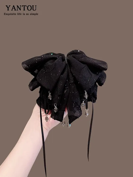 黑色高级感蝴蝶结吊珠抓夹2025新款后脑勺高端高马尾发夹头饰女