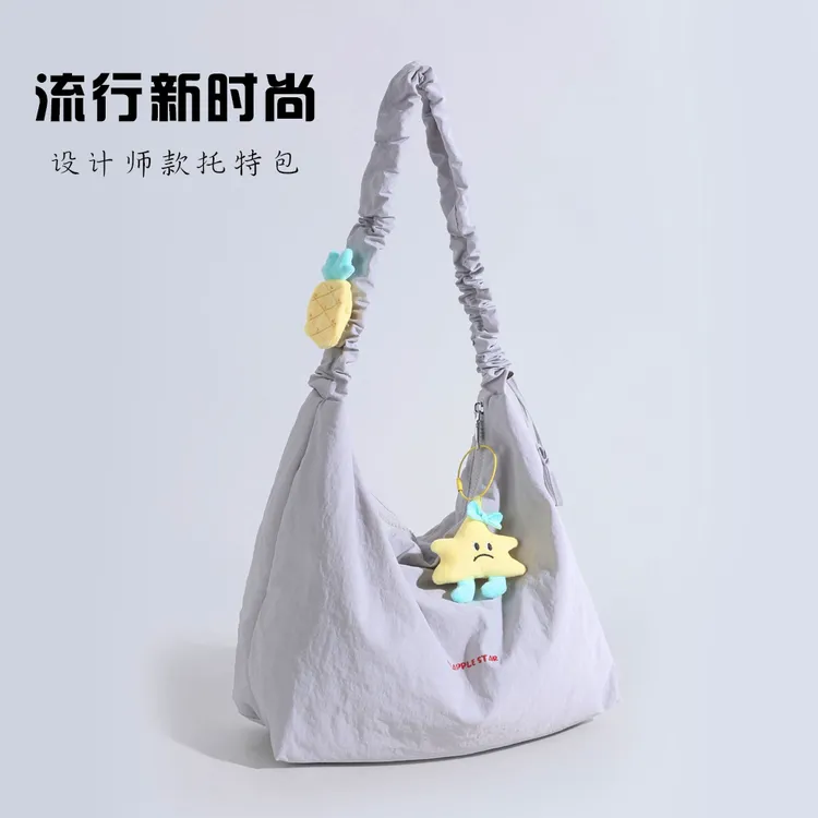 2025新款原创小众设计单肩斜挎包女休闲简约大容量学生通勤托特包