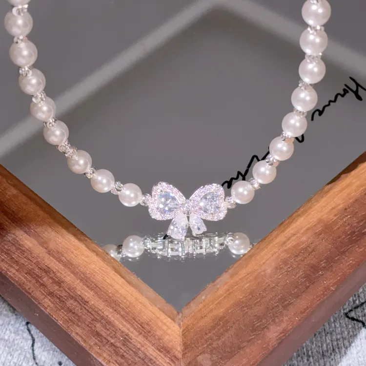 铜合金仿珍珠项链 新款超闪甜蜜蝴蝶结珠珠项链颈链 HDJ6