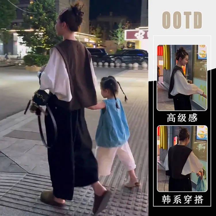 2025秋季新款时尚小众高级假两件设计长袖上衣女黑色裤子两件套潮