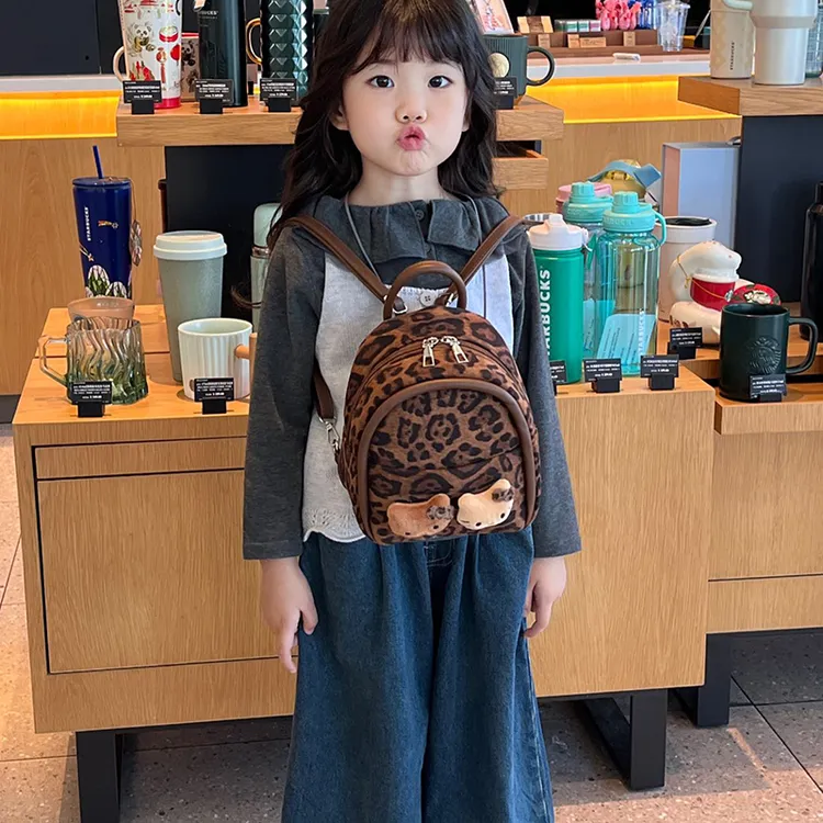 儿童秋冬韩系豹纹猫咪双肩包女童2025新款小众可爱背包毛绒手提包