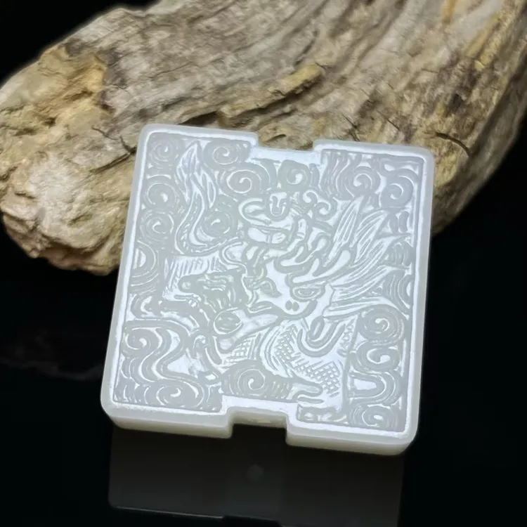 和田玉乘龙童子太极云纹穿心佩龙佩