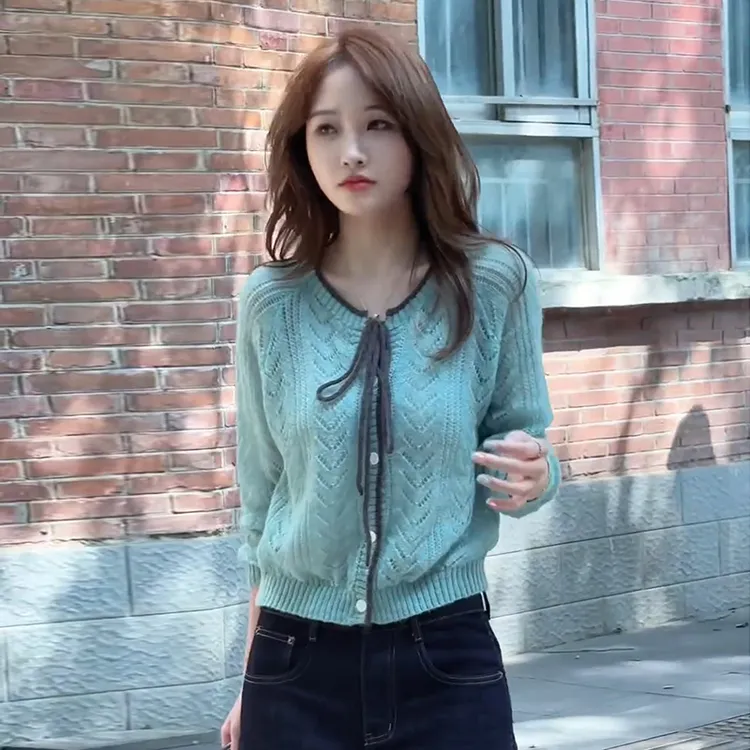 欧货设计感蓝色镂空系带针织衫女2025早秋新款超好看显白显瘦毛衣