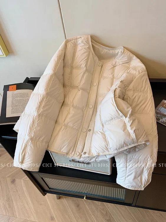 法式轻奢风圆领羽绒服女冬季2025新款简约气质保暖显瘦高级感上衣