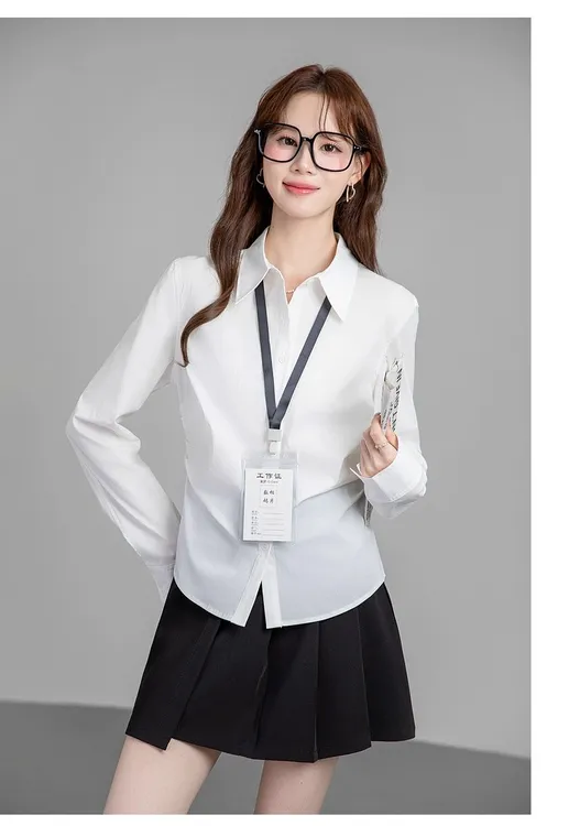 法式复古风蓝色长袖衬衫女2025年秋季新款设计感职业修身收腰上衣