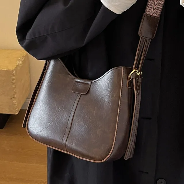 小ck今年流行包包女2025新款高级感复古通勤单肩包百搭宽带斜挎水
