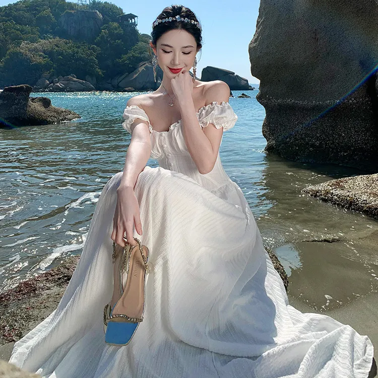女神白色连衣裙夏季氛围感海边拍照埃及度假风一字领露背收腰长裙