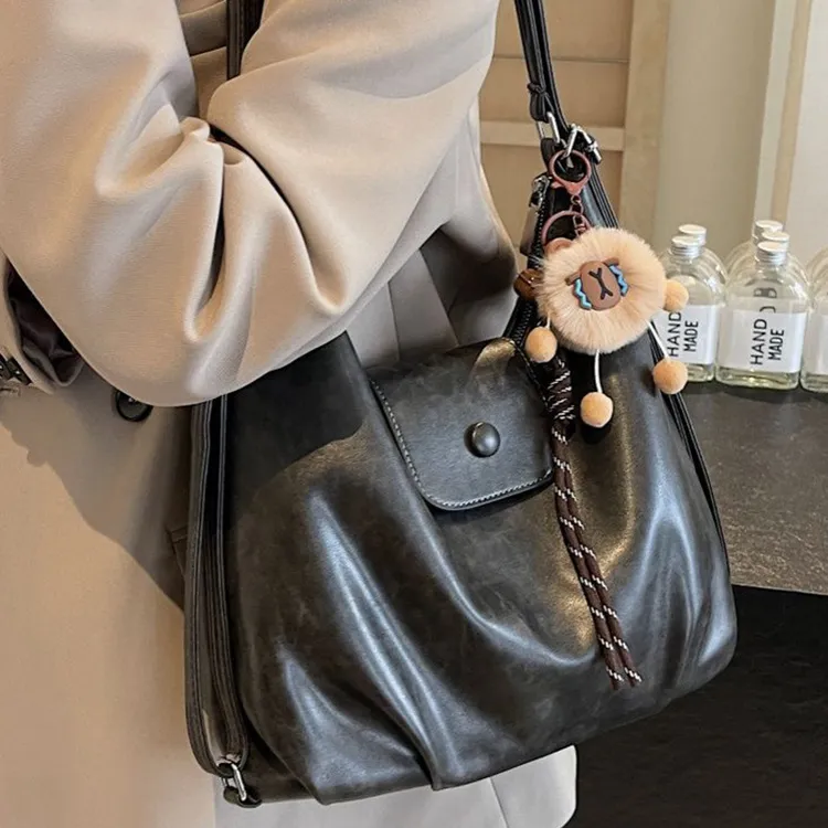 女包单肩托特包女2025新款大容量通勤双肩包设计感轻便旅游背包女