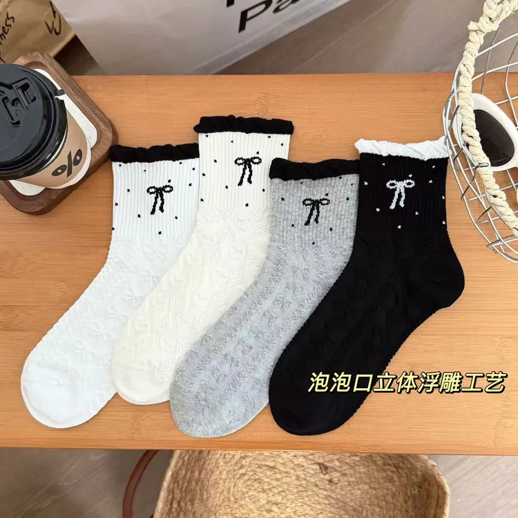 蝴蝶结浮雕泡泡口花边秋冬新款堆堆袜学生ins女袜网红中筒袜T