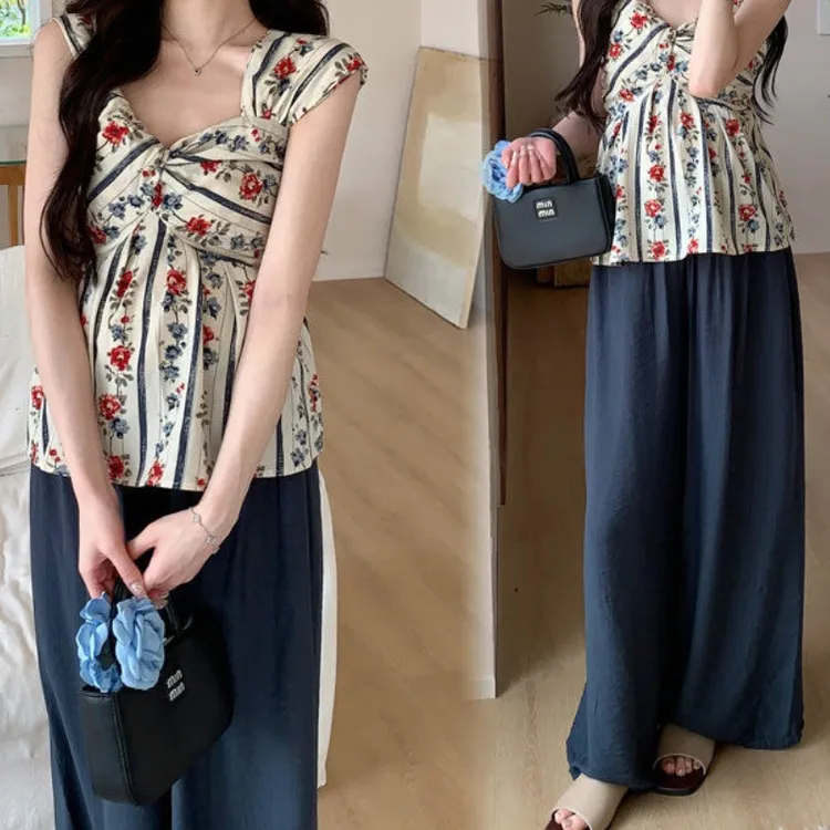 时尚女夏新款碎花吊带衫配高腰阔腿藏青色休闲裤两件套2025春