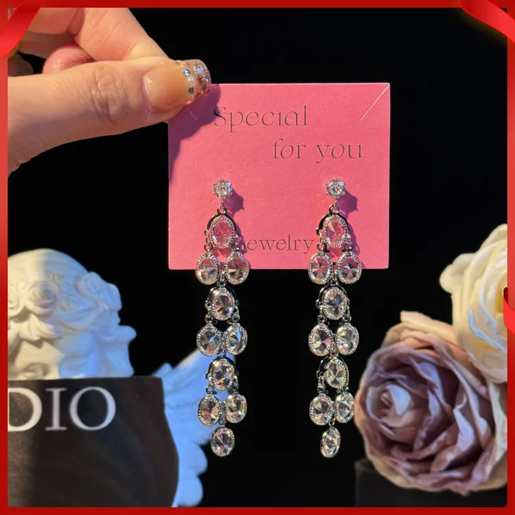 合金耳饰 初夏轻奢超闪合金长款流苏耳环气质时尚星星日月云朵宇