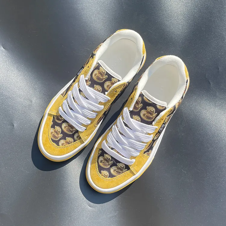 新款男鞋帆布鞋时尚百搭男士低帮小众个性原创运动鞋黄色印花潮鞋