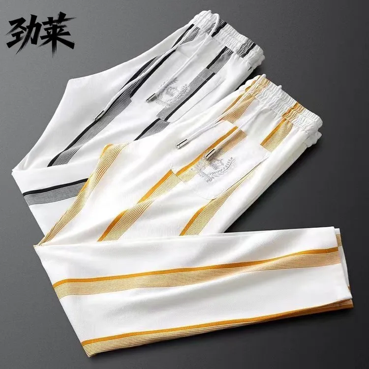 欧洲站欧货轻奢潮流条纹休闲裤男士夏季薄款修身百搭时尚刺绣直筒