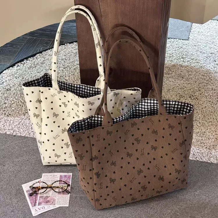 小橙子原创 大容量蝴蝶结条绒包包女 百搭单肩时尚手提通勤托特包